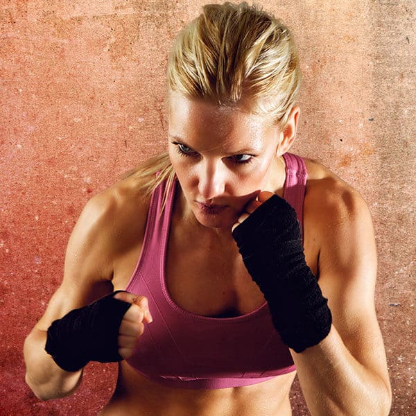 Mixed Martial Arts Lessons for Adults in Rosemead CA - Lady Kickboxing Focused Background