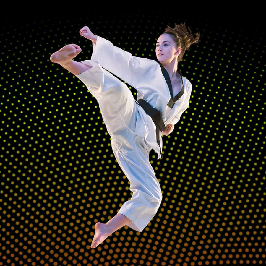 Martial Arts Lessons for Adults in Rosemead CA - Girl Black Belt Jumping High Kick